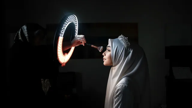 woman, bride, veil, make-up, getting ready, brush, hand, light, ring light, storiesofdiversity, ring light, ring light, ring light, ring light, ring light. Why beauty influencers' partnership costs vary